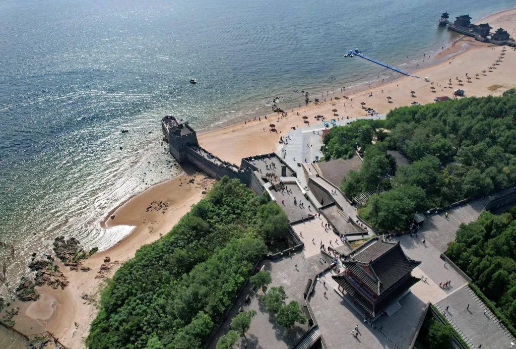 Aerial view of Laolongtou coastal Great Wall, beach and Bohai Sea in Shanhaiguan