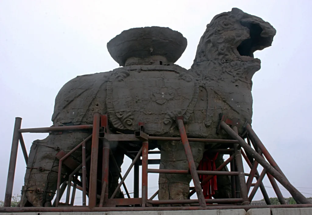 Close side view of the Cangzhou Iron Lion showing the ancient cast iron body