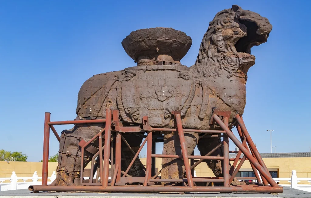 Side detail of the Cangzhou Iron Lion with support structure