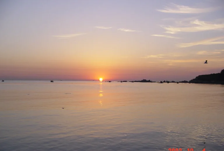 Sunrise over the Beidaihe coast near Pigeon Nest Park in Qinhuangdao