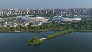Aerial view of Tangshan Nanhu Park lake and city skyline