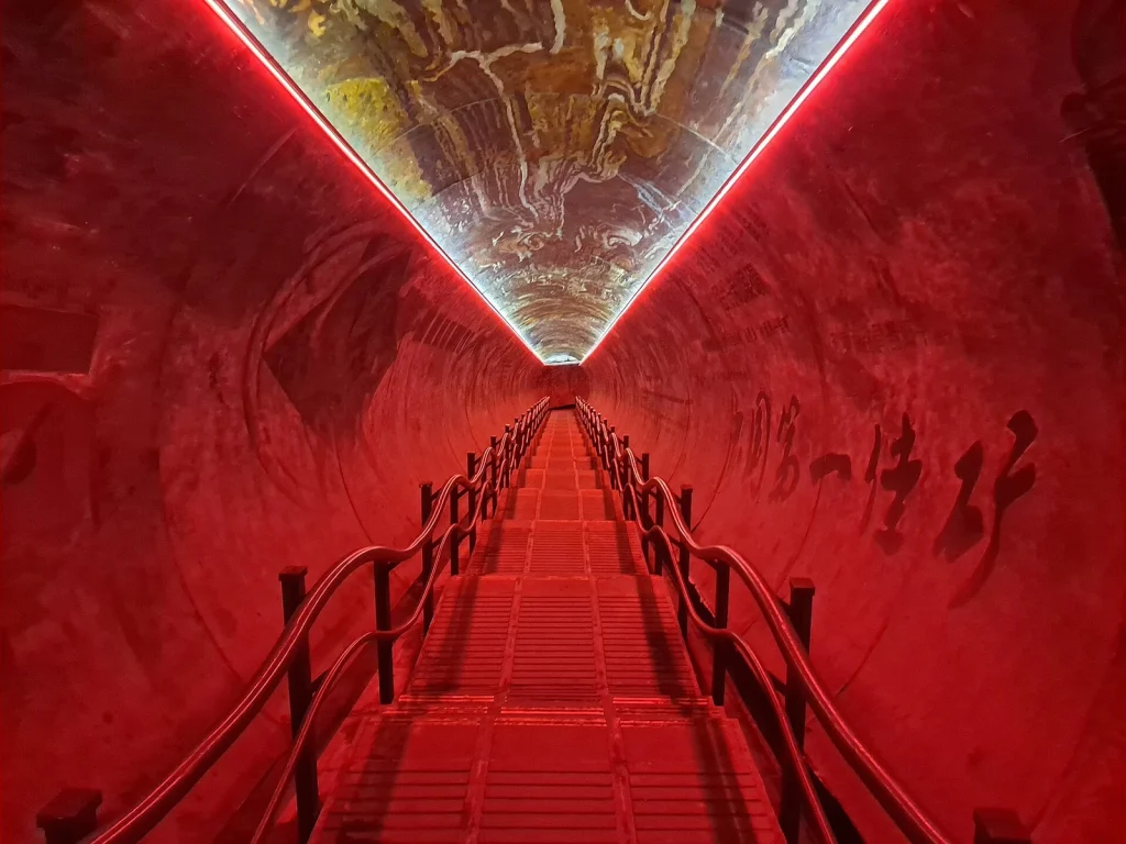 Underground visitor stair and mining-themed display at Kailuan National Mine Park