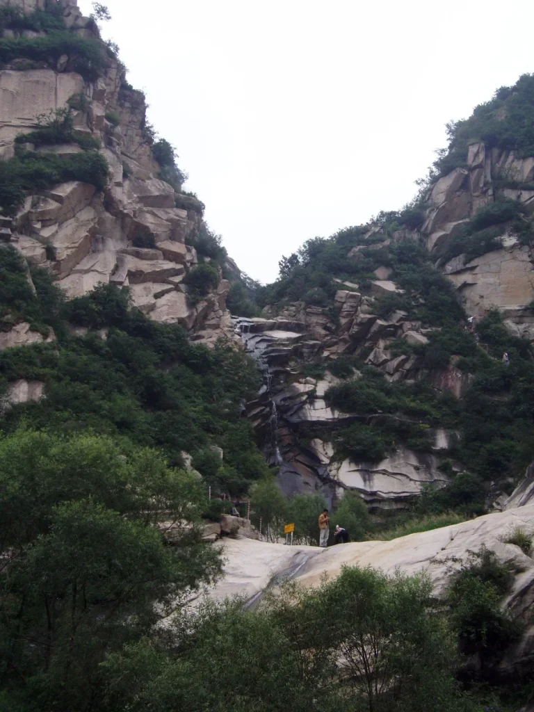 Real rocky gorge and waterfall scene at Baishi Mountain in Laiyuan