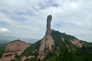 Qingchui Peak rising from a sandstone ridge in Chengde