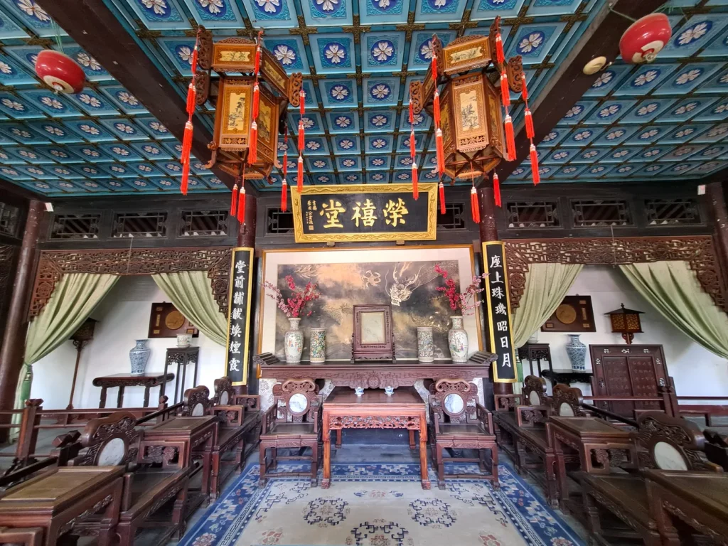Furnished interior of Rongxi Hall at Rongguo Mansion