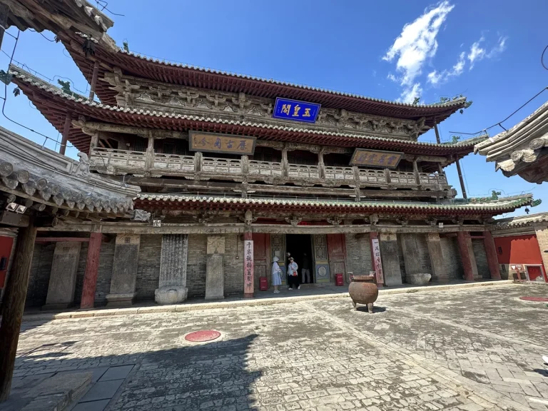 Timber balconies and layered tiled roofs of Yuhuang Pavilion in Yuzhou Ancient City
