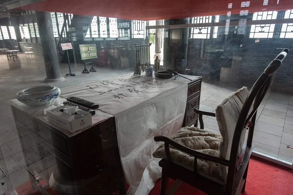 Desk and writing materials in an interior display at Dingzhou Gongyuan